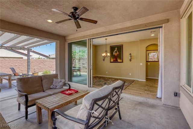 view of patio with an outdoor hangout area and ceiling fan