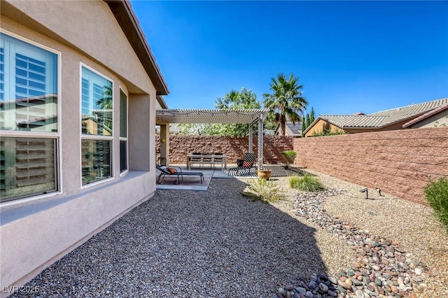 view of yard featuring a pergola and a patio