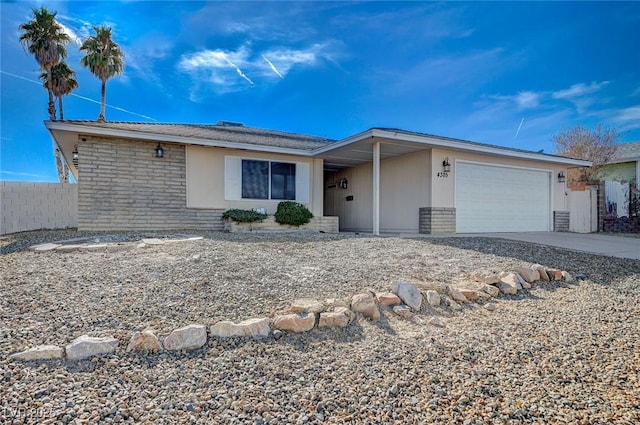 single story home with a garage