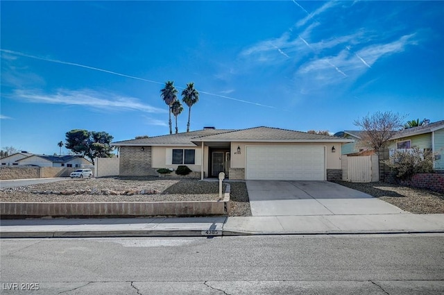 single story home featuring a garage