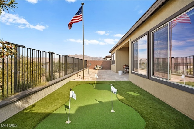 view of property's community featuring a patio area