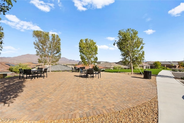 view of patio / terrace featuring a mountain view