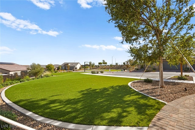 view of community with a lawn