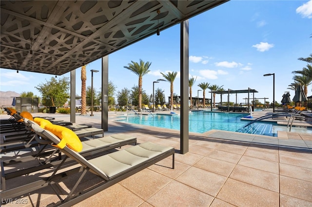 view of pool featuring a patio area