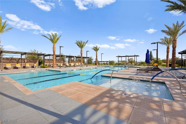 view of swimming pool featuring a patio