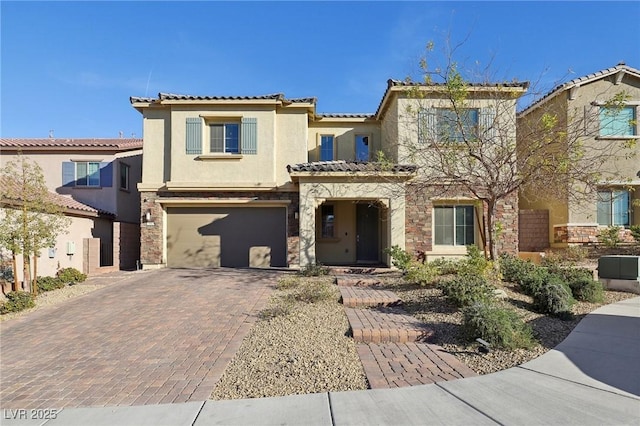 mediterranean / spanish-style home featuring a garage