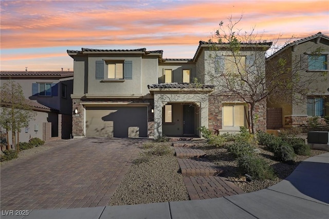 mediterranean / spanish-style house featuring a garage