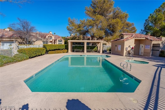 view of swimming pool with a patio area