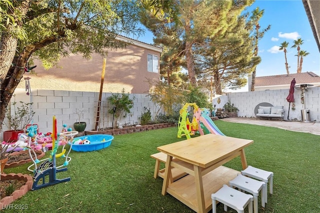 view of yard featuring a playground