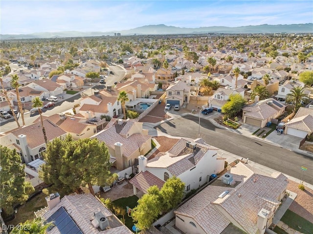 drone / aerial view featuring a mountain view