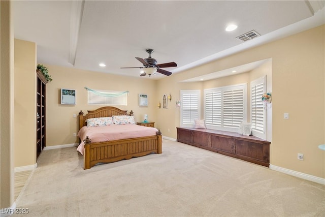 bedroom with light colored carpet and ceiling fan