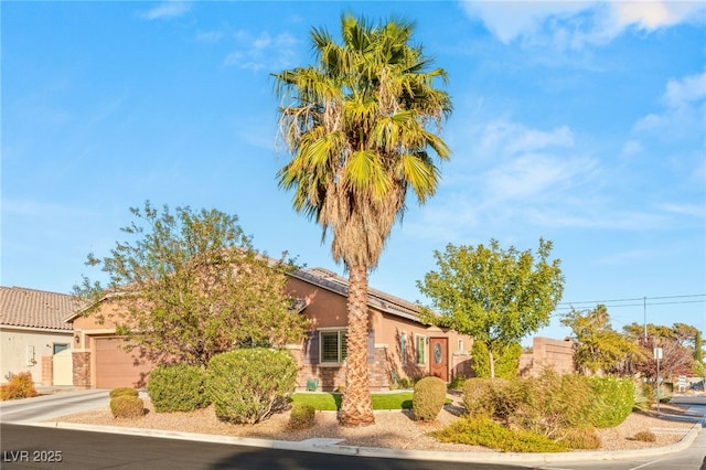 view of front of home featuring a garage