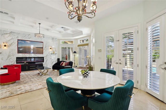 dining space featuring a high end fireplace, coffered ceiling, french doors, light tile patterned floors, and beamed ceiling