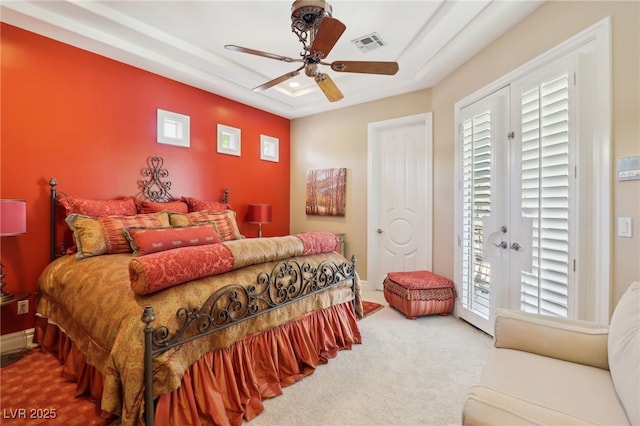 bedroom featuring multiple windows, french doors, access to outside, and ceiling fan