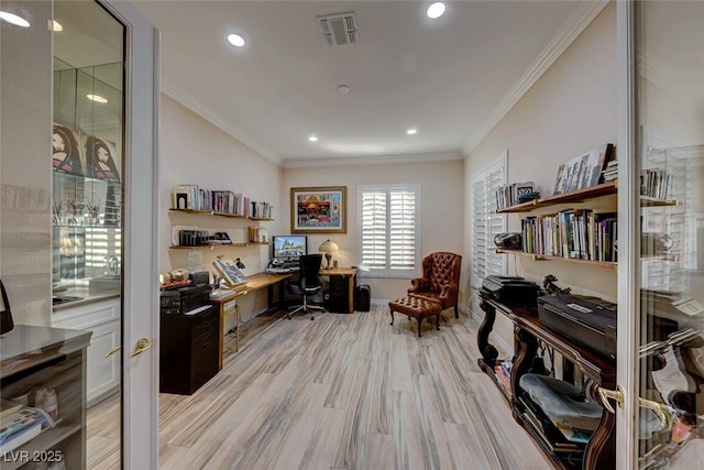 office area featuring light wood-type flooring and ornamental molding