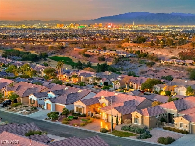 aerial view at dusk with a mountain view