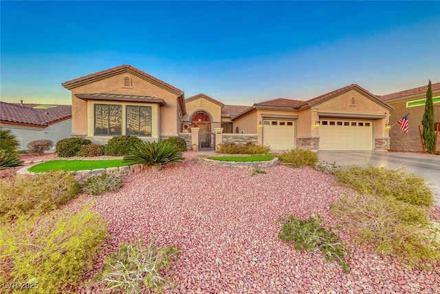 view of front of property featuring a garage