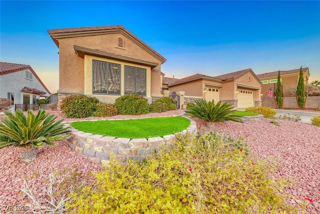 view of front of home featuring a garage