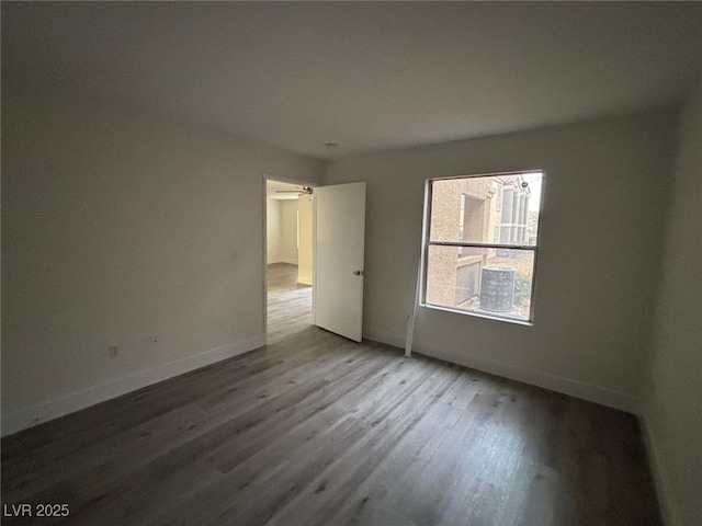 spare room featuring hardwood / wood-style flooring