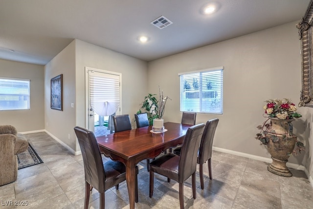 dining area with plenty of natural light