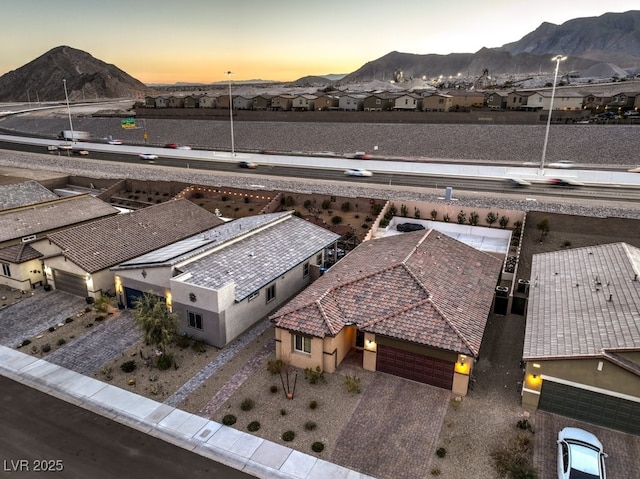 aerial view at dusk with a mountain view