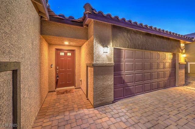 exterior space with a garage