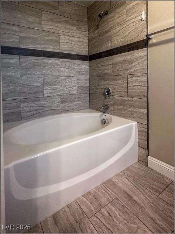 bathroom featuring shower / washtub combination