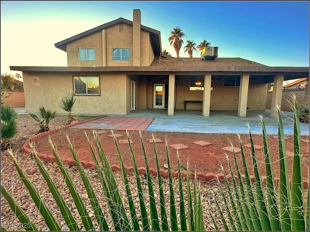 rear view of property with a patio area