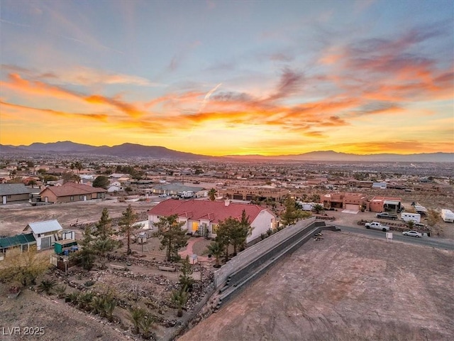 aerial view at dusk with a mountain view