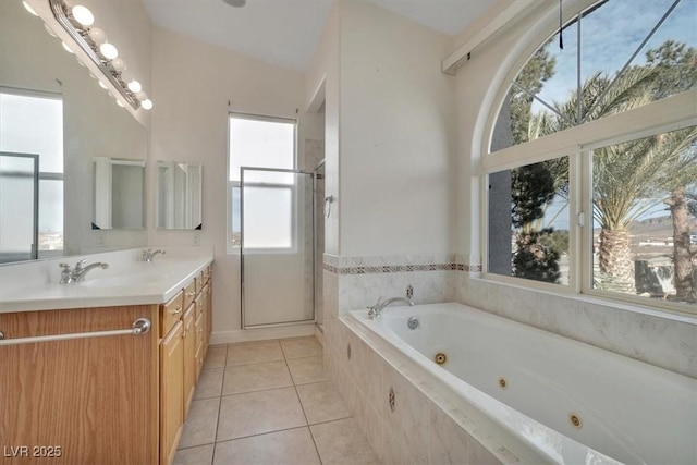 bathroom with tile patterned floors, vanity, and plus walk in shower