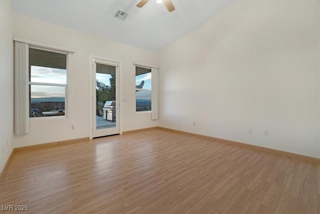 unfurnished room featuring light hardwood / wood-style flooring and ceiling fan