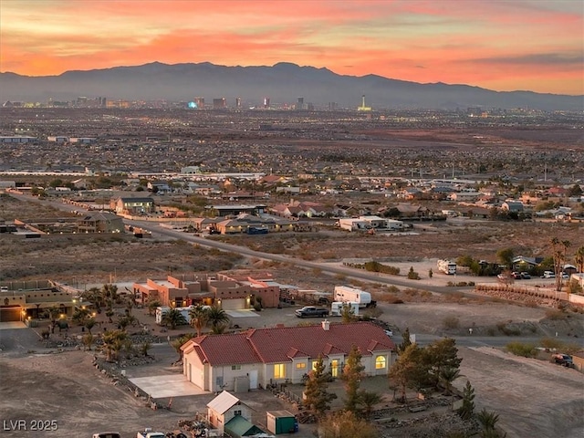 aerial view at dusk with a mountain view