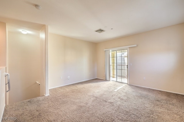 spare room with carpet flooring