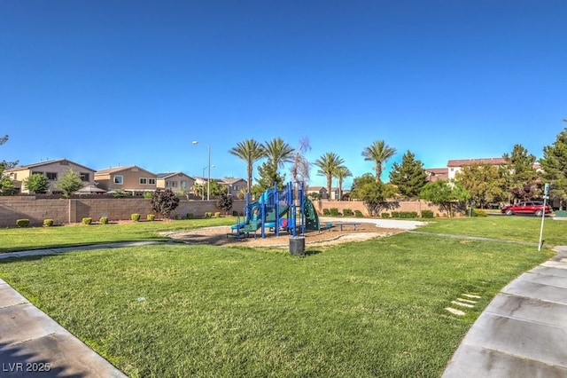 view of playground with a yard