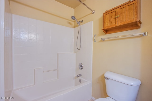 bathroom featuring  shower combination and toilet