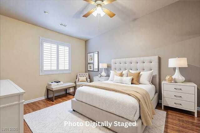 bedroom with dark wood-type flooring and ceiling fan