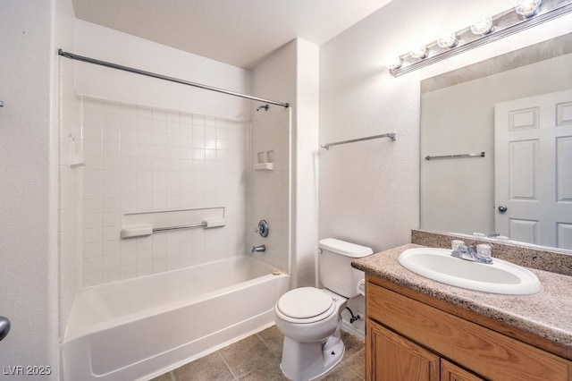 full bathroom featuring tile patterned flooring, vanity, toilet, and shower / washtub combination