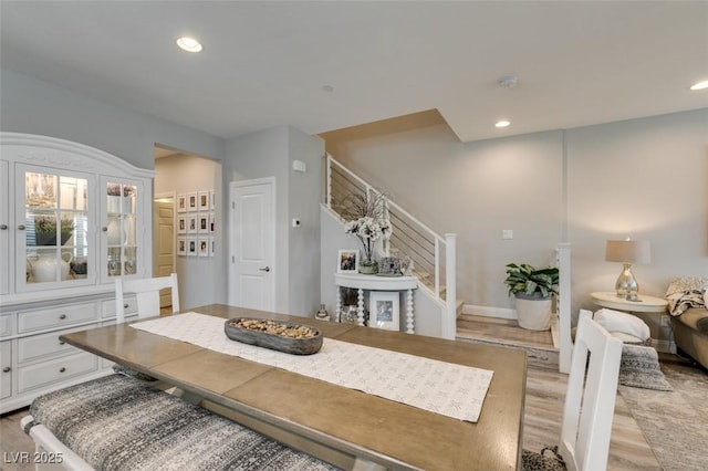 dining area with light hardwood / wood-style flooring