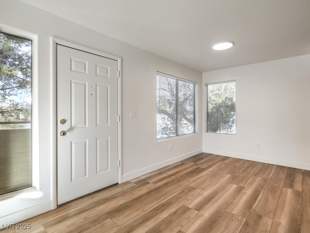 entrance foyer featuring light hardwood / wood-style floors