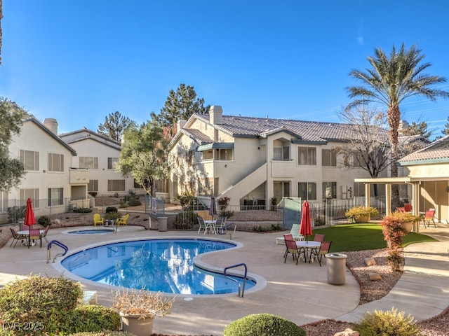 view of pool featuring a patio