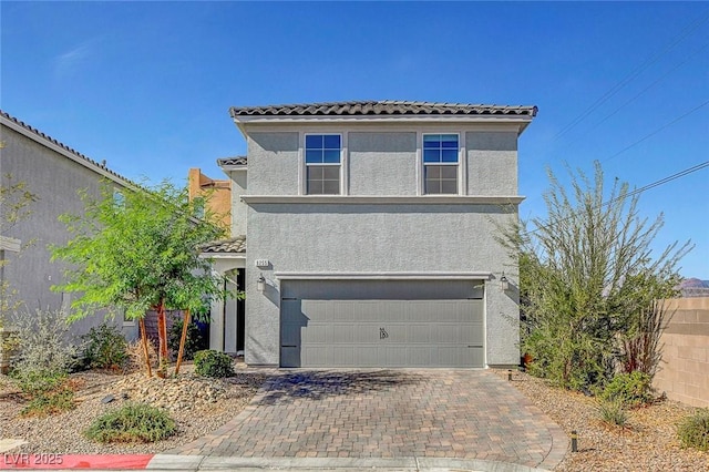 view of front of property with a garage