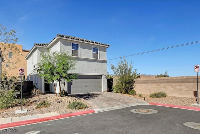 view of front of property featuring a garage