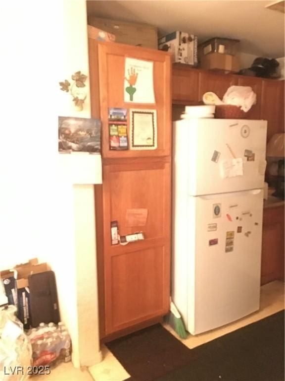 kitchen featuring white refrigerator