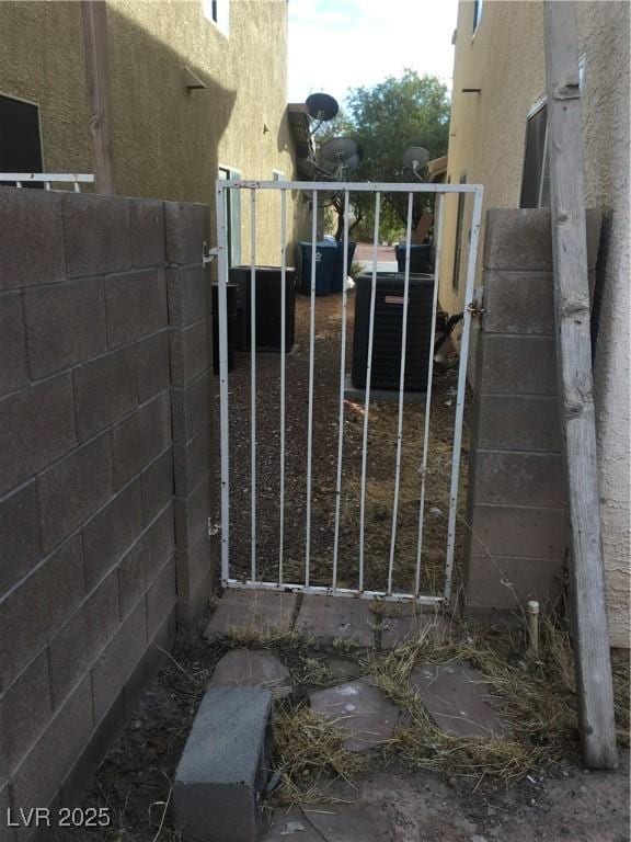 view of gate with central AC unit