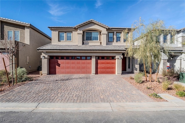 view of front of property featuring a garage