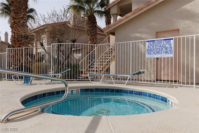 view of pool featuring a community hot tub