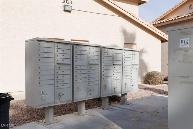 view of property's community with a mail area