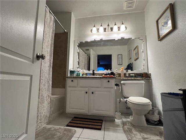 full bathroom with tile patterned flooring, vanity, toilet, and shower / bath combo with shower curtain