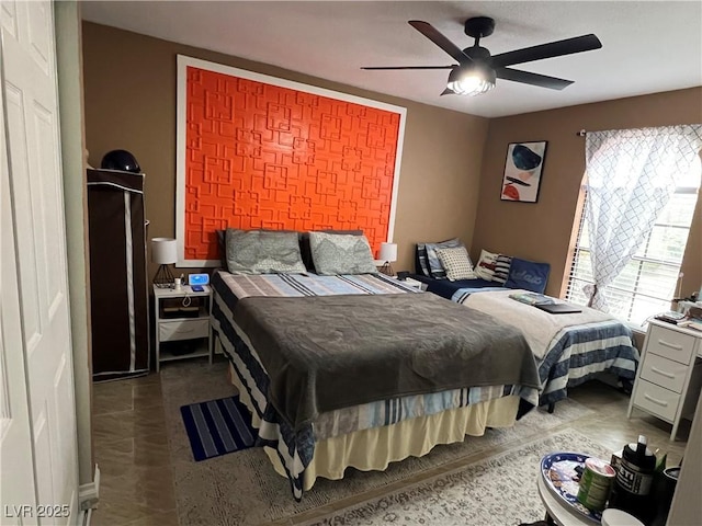 bedroom featuring ceiling fan