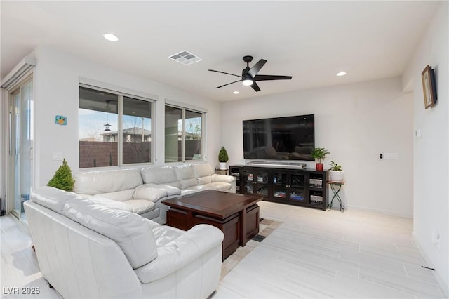 living room with ceiling fan